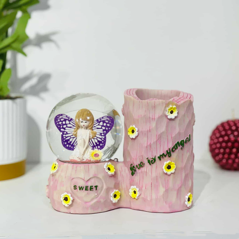 Boule de neige avec porte stylos 